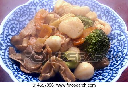 Stock Photograph - Fried vegetables dish, close up. Fotosearch