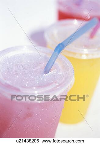 Fruits juice in cups, close up, white background View Large Photo Image Stock Photograph - Fruits juice in cups, close up, white background. Fotosearch