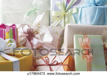 Stock Image - Gift-wrapped presents. Fotosearch