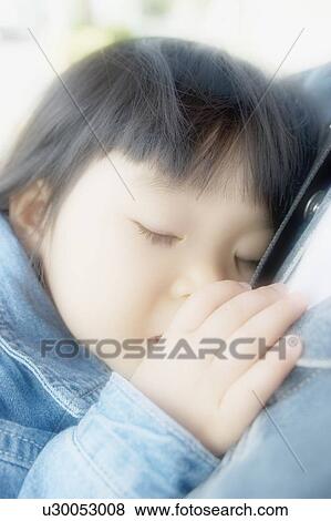 Girl sucking thumb, sleeping, close up, soft focus View Large Photo Image Stock Photo - Girl sucking thumb, sleeping, close up, soft focus. Fotosearch