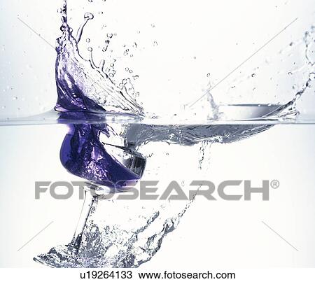Glass dropped in water, white background View Large Photo Image Stock Image - Glass dropped in water, white background. Fotosearch