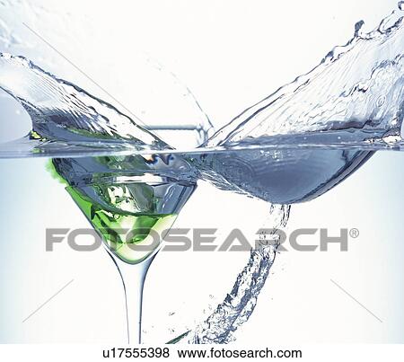 Glass dropped in water, white background View Large Photo Image Stock Photo - Glass dropped in water, white background. Fotosearch