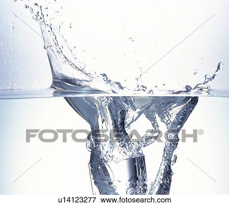 Stock Photo - Glass falling into water. Fotosearch