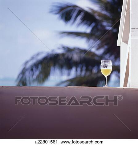 Stock Image - Glass of beer, Saipan. Fotosearch