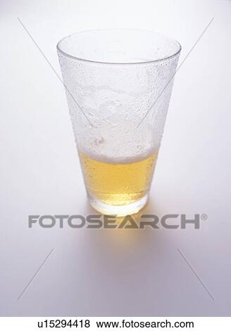 Stock Photo - Glass of beer, white background. Fotosearch