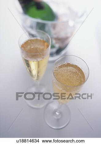 Picture - Glasses of champagne, white background. Fotosearch