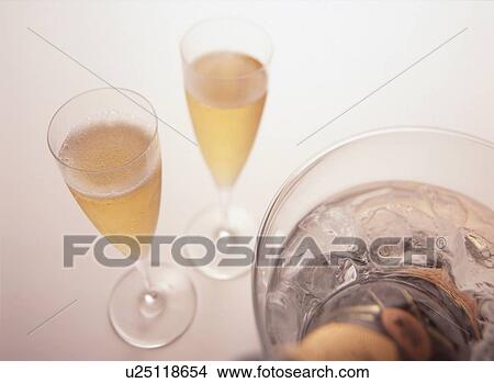 Glasses of champagne, white background View Large Photo Image Picture - Glasses of champagne, white background. Fotosearch