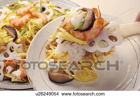 Hand serving Gomoku Chirashi-zushi View Large Photo Image Picture - Hand serving Gomoku Chirashi-zushi. Fotosearch