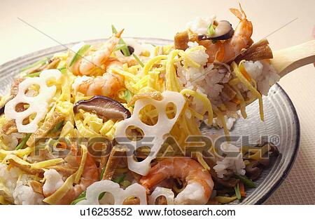 Hand serving Gomoku Chirashi-zushi View Large Photo Image Stock Image - Hand serving Gomoku Chirashi-zushi. Fotosearch