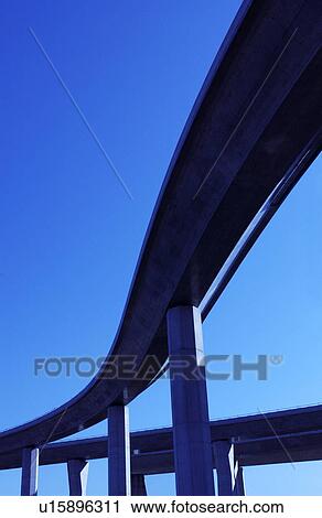 Stock Image - Highway against blue sky, toned image, Tokyo prefecture, Japan. Fotosearch