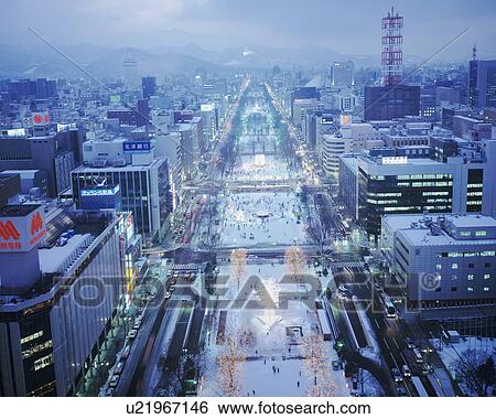 Stock Photograph - Illuminated street, Sapporo city, Hokkaido prefecture, Japan. Fotosearch