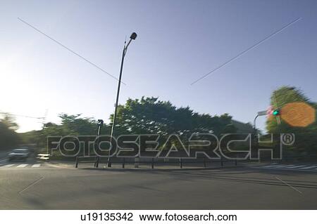 Stock Image - Intersection, blurred motion, Tokyo prefecture, Japan. Fotosearch