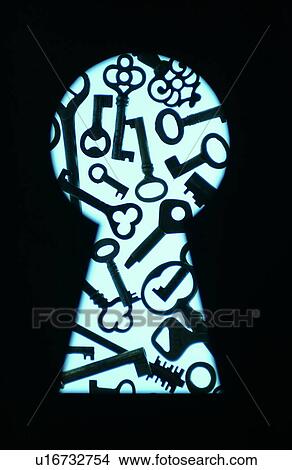 Keys in frame of keyhole, black background View Large Photo Image Picture - Keys in frame of keyhole, black background. Fotosearch