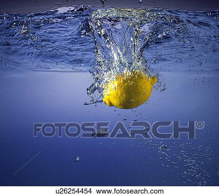 Picture - Lemon in water. Fotosearch