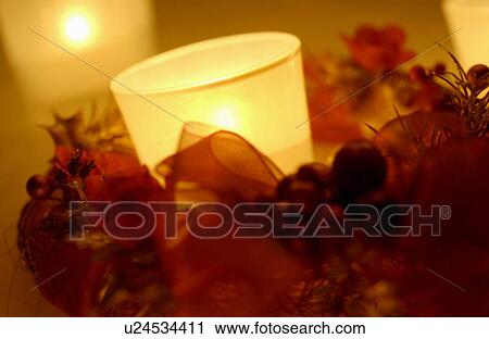 Stock Image - Lit candles. Fotosearch