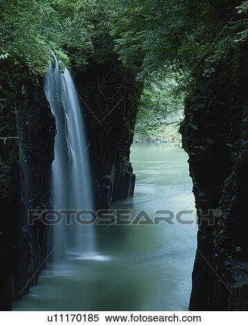Stock Photography - Manai fall in summer, long exposure, Takachiho town, Miyazaki prefecture, Japan. Fotosearch