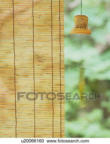 Metal wind chime and blinds View Large Photo Image Stock Image - Metal wind chime and blinds. Fotosearch