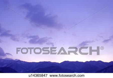 Mountain peak in dusk View Large Photo Image Stock Photo - Mountain peak in dusk. Fotosearch