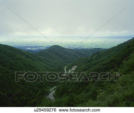 Stock Photograph - Mountain road, Kitakata city, Fukushima prefecture, Japan. Fotosearch
