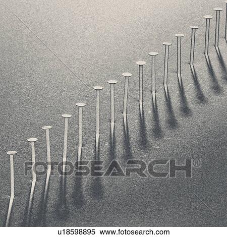 Stock Photography - Nails in a row. Fotosearch