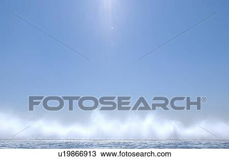 Ocean surf against blue sky, copy space View Large Photo Image Stock Image - Ocean surf against blue sky, copy space. Fotosearch