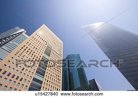 Office buildings under the blue sky, Tokyo prefecture, Japan View Large Photo Image Stock Image - Office buildings under the blue sky, Tokyo prefecture, Japan. Fotosearch