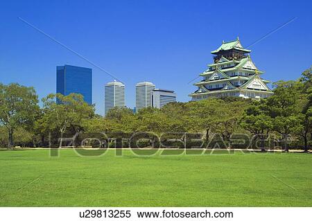 Osaka Castle and office buildings from park, Osaka city, Osaka prefecture, Japan View Large Photo Image Stock Photography - Osaka Castle and office buildings from park, Osaka city, Osaka prefecture, Japan. Fotosearch