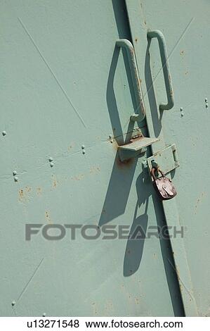 Stock Photo - Padlock on Storehouse Door. Fotosearch