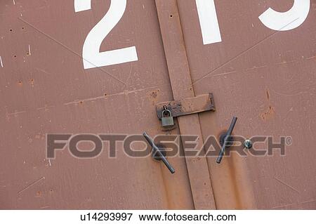 Stock Photo - Padlock on Storehouse Door. Fotosearch