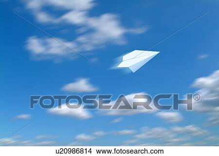 Picture - Paper Airplane Flying in Sky. Fotosearch