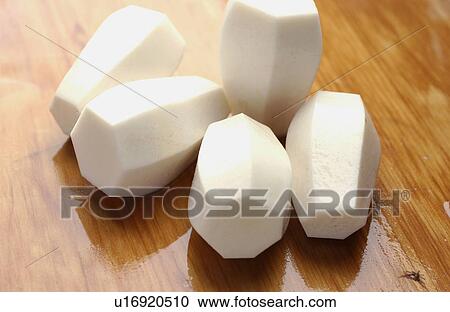 Stock Image - Peeled aroids, close up. Fotosearch