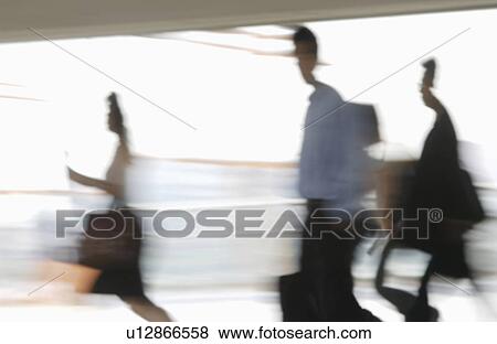People walking down the passage, blurred motion View Large Photo Image Stock Photo - People walking down the passage, blurred motion. Fotosearch