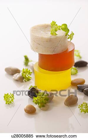 Stock Photography - Pile of soaps, white background. Fotosearch