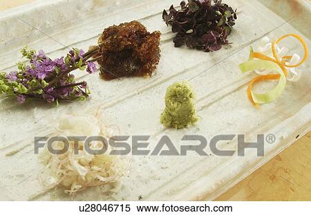 Plate of assorted condiments, close up View Large Photo Image Stock Photography - Plate of assorted condiments, close up. Fotosearch
