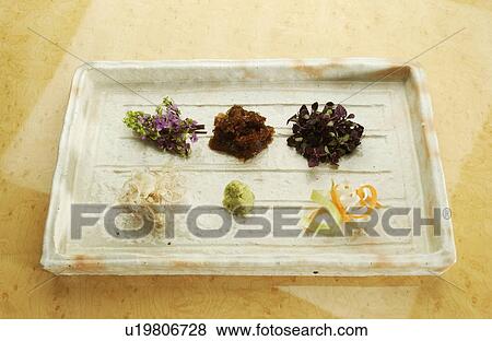 Stock Photo - Plate of assorted condiments. Fotosearch