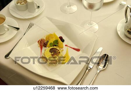 Stock Photo - Plate of citrus fruits terrine. Fotosearch
