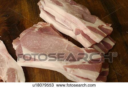 Pork chops, close up View Large Photo Image Stock Image - Pork chops, close up. Fotosearch