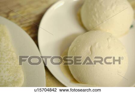 Raw dumplings on plate, close up View Large Photo Image Stock Image - Raw dumplings on plate, close up. Fotosearch