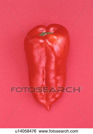 Stock Photograph - Red bell pepper, red background. Fotosearch