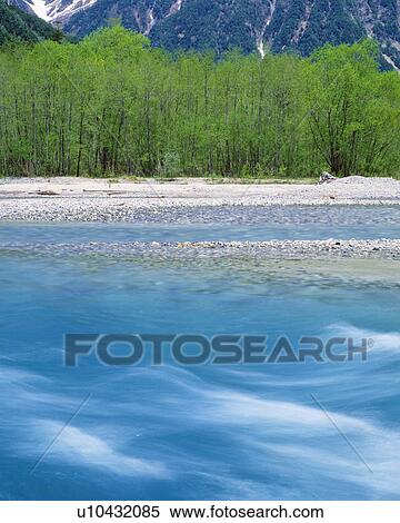 River and trees with green leaves, long exposure, Matsumoto city, Nagano prefecture, Japan View Large Photo Image Stock Photography - River and trees with green leaves, long exposure, Matsumoto city, Nagano prefecture, Japan. Fotosearch
