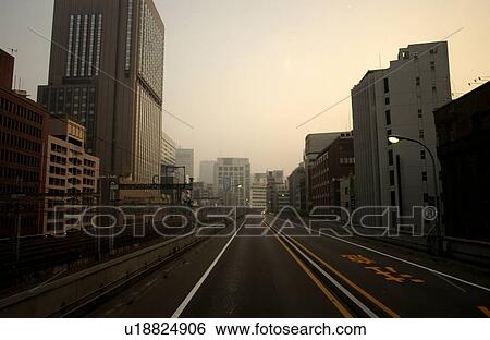 Road and buildings View Large Photo Image Stock Photograph - Road and buildings. Fotosearch