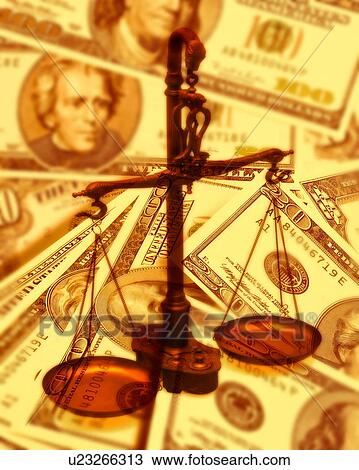 Stock Image - Scale and US currencies. Fotosearch