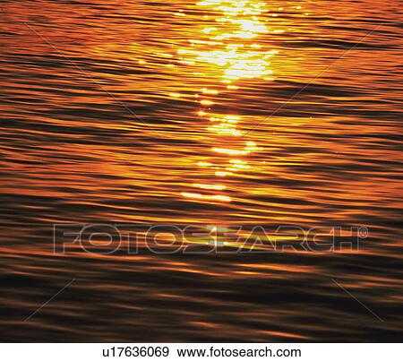 Sea in sunset, full frame View Large Photo Image Stock Photo - Sea in sunset, full frame. Fotosearch