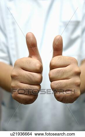 Shiatsu masseuse with his thumbs up View Large Photo Image Picture - Shiatsu masseuse with his thumbs up. Fotosearch