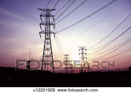 Silhouette of power pylons View Large Photo Image Stock Photo - Silhouette of power pylons. Fotosearch
