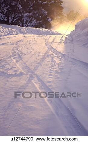 Stock Image - Snow on road . Fotosearch