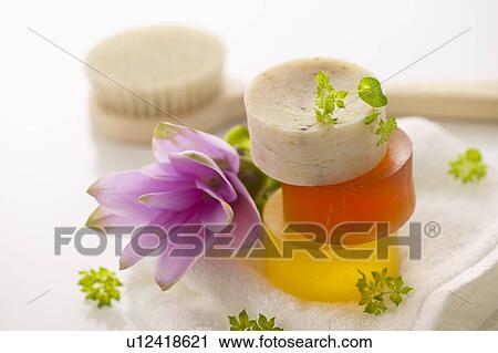 Soaps on towel, white background View Large Photo Image Stock Image - Soaps on towel, white background. Fotosearch