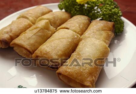 Spring rolls on plate, close up View Large Photo Image Stock Photography - Spring rolls on plate, close up. Fotosearch