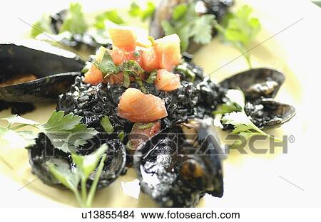 Squid ink risotto View Large Photo Image Picture - Squid ink risotto. Fotosearch