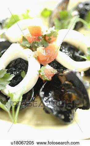 Squid ink risotto View Large Photo Image Stock Photography - Squid ink risotto. Fotosearch